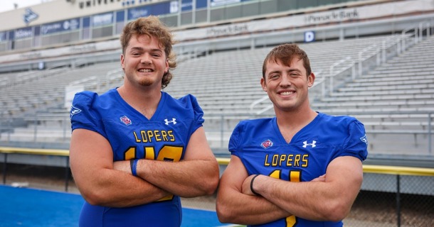 Parker Wise (4) and Jack Johnson (48) are UNK team captains this season. (Photo by Todd Gottula, UNK Communications)